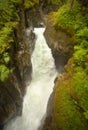 Waterfall in the narrow gorge Royalty Free Stock Photo