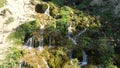 Waterfall in the national park. Waterfall full of mosses. Waterfall Pisoaia. Royalty Free Stock Photo