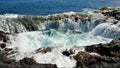 Waterfall in natural pool, coast of Gran canaria, Canary islands Royalty Free Stock Photo