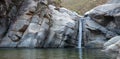 Waterfall and natural swimming pool at Cascada Sol Del Mayo on the Baja California peninsula in Mexico