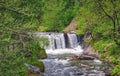 Waterfall on North Caucasus mountain river. Spring view Royalty Free Stock Photo