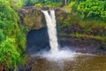 Waterfall Oasis in Wailuku River State Park Royalty Free Stock Photo