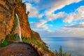 Waterfall on an old road near Ponta do Sol in Madeira Island, Portugal Royalty Free Stock Photo