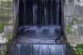 The waterfall out dam of city pond in Bueckeburg, Germany