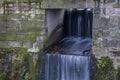 The waterfall out dam of city pond in Bueckeburg, Germany