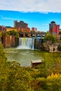 Waterfall over cliffs right inside city of Rochester in early fall Royalty Free Stock Photo