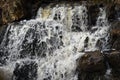 Waterfall over Giant Rocks - Governor Dodge State Park Royalty Free Stock Photo