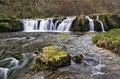 Waterfall over Mossy Rocks Royalty Free Stock Photo