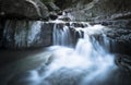 Waterfall over sliver rock