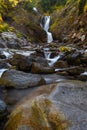 Waterfall Pours Over Cliff and Rocks