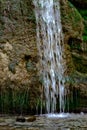 Waterfall from ravine.waterfall from the mountain river. rapid current Royalty Free Stock Photo