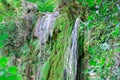 Waterfall from ravine.waterfall from the mountain river. rapid current Royalty Free Stock Photo