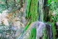 Waterfall from ravine.waterfall from the mountain river. rapid current Royalty Free Stock Photo