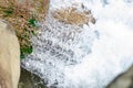 Waterfall from ravine.waterfall from the mountain river. rapid current Royalty Free Stock Photo