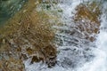 Waterfall from ravine.waterfall from the mountain river. rapid current Royalty Free Stock Photo