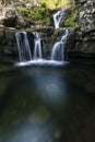 Waterfall and river with crystal clear waters