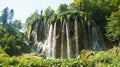 Waterfall and rock, beautiful nature landscape, Plitvice Lakes in Croatia, National Park, sunny day Royalty Free Stock Photo