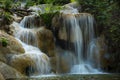 Waterfall and rock in the forest in summer Royalty Free Stock Photo