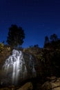 Waterfall rock night sky stars