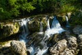 Cascade of waterfalls. Stormy flow of water of a mountain river. Royalty Free Stock Photo