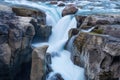 Waterfall and rocks. Long exposure photography. Fast river and waterfall. Natural background and wallpaper.