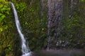 Waterfall among rocks. Madeira Island, Portugal, Europe. Long exposure photo. Royalty Free Stock Photo