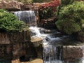 Waterfall Running Down from Piles of Stones