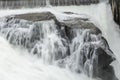 Waterfall rushing over rocks Royalty Free Stock Photo