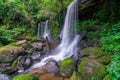 Waterfall scene at Rom Klao Pharadon Waterfalls in rainforest Thailand