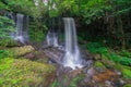 Waterfall scene at Rom Klao Pharadon Waterfalls in rainforest Thailand