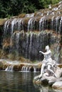 Waterfall and sculpture Royalty Free Stock Photo