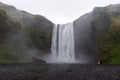 Waterfall Skogafoss in Icelandic nature landscape Royalty Free Stock Photo