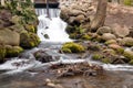 Waterfall on a small river in a park