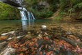 Waterfall from the source of the Lison in a haven of peace with its waterfall surrounded by forest