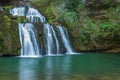 Waterfall from the source of the Lison in a haven of peace with its waterfall surrounded by forest