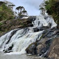 Stone river waterfall seen from below Royalty Free Stock Photo