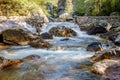 Waterfall with stones in wild nature in Fragas de Sao Simao, Figueiro dos Vinhos, Leiria, Portugal Royalty Free Stock Photo