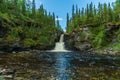 Waterfall in the Swedish highlands flushing down eroded rocks