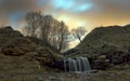 Waterfall on the Tosna river, Russia Royalty Free Stock Photo