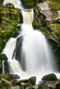 A waterfall in Triberg black forest with a misty spray Royalty Free Stock Photo