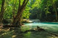 Waterfall in tropical deep forest at Erawan National Park Royalty Free Stock Photo