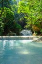 Waterfall in tropical deep forest at Erawan National Park Royalty Free Stock Photo