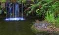Waterfall in tropical garden Royalty Free Stock Photo