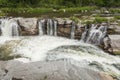 Waterfall under a bridge Royalty Free Stock Photo