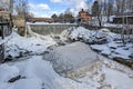 Waterfall in Vanhankaupunginkoski and old power station, Helsinki Royalty Free Stock Photo