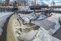 Waterfall in Vanhankaupunginkoski and old power station, Helsinki Royalty Free Stock Photo