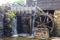 The waterfall and water stream at Historic Yates Mill County Park Royalty Free Stock Photo