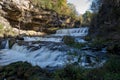 Waterfall at Willow River State Park in Hudson Wisconsin in fall.  Daytime long exposure Royalty Free Stock Photo