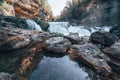 Waterfall at Willow River State Park in Hudson Wisconsin in fall.  Daytime long exposure Royalty Free Stock Photo