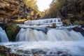 Waterfall at Willow River State Park in Hudson Wisconsin in fall. Daytime long exposure with silky water Royalty Free Stock Photo